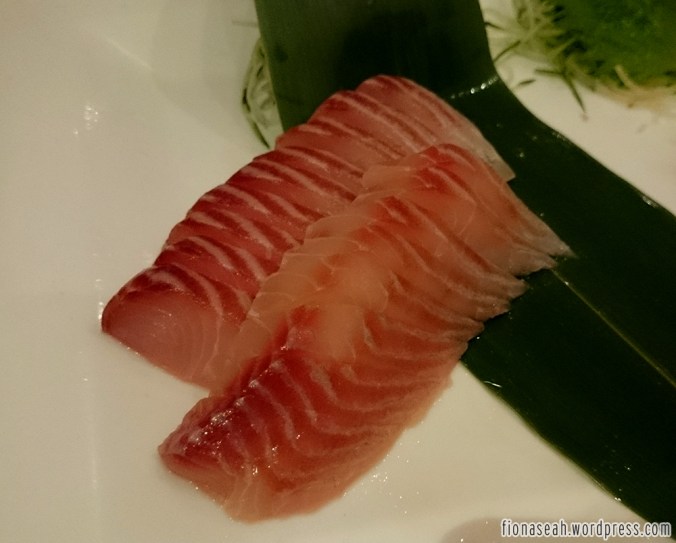 Sashimi. Not sure what kind. It could be tuna.