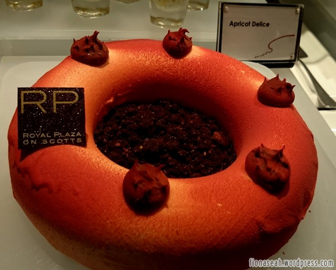 Nice pink donut-cake. I quickly snap a picture of this before someone sliced it.