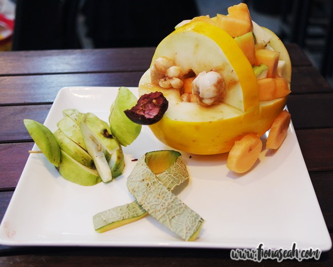 Our creation made up of several elements - a swan, an animal-shaped truck containing diced fruits and an LKY-inspired ribbon in the middle