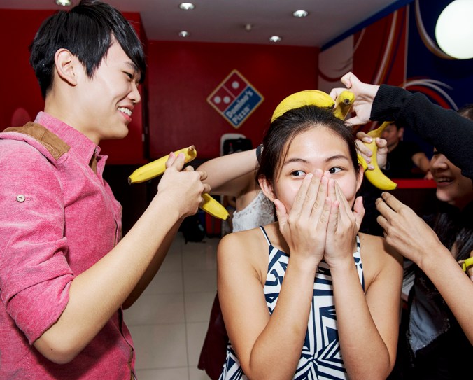 One of the games lined up for us was to stack as many bananas as possible on a team member's head and thereafter, walk to the other end of the restaurant without toppling them over. Unfortunately none of us could do that u_u (photo credit: The Influencer Network) 