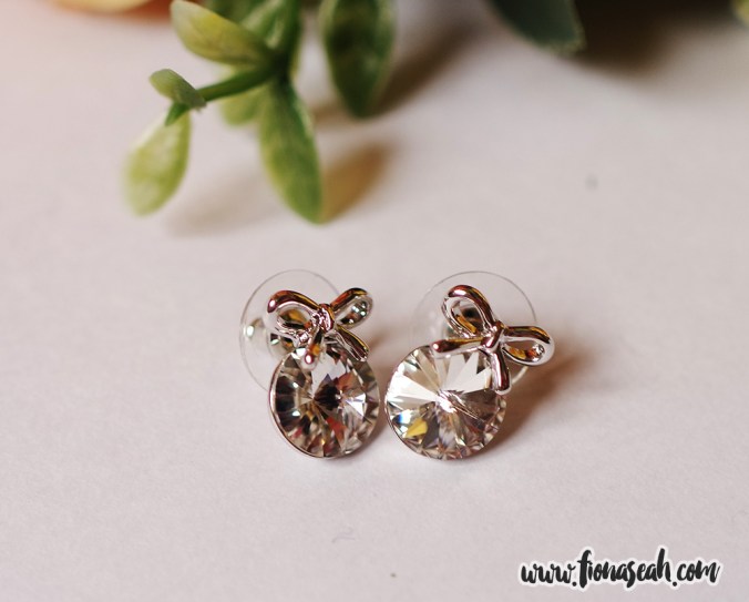 Austrian Crystal Bowknot Round White Ear Studs, was on offer at S$19.53