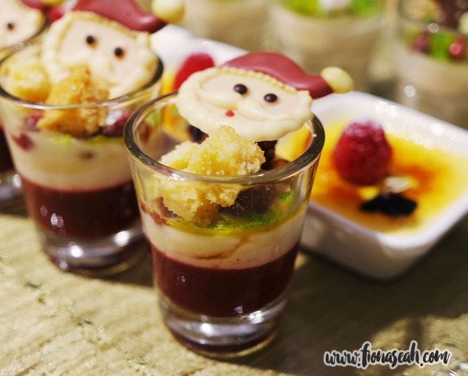 Santa Claus atop raspberry puree