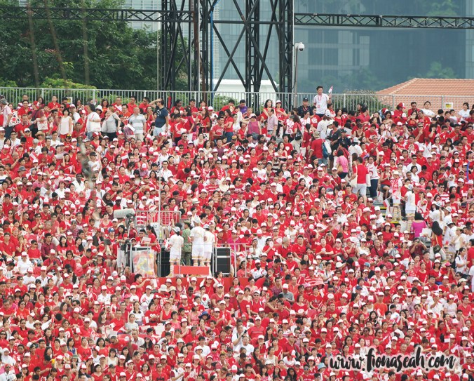 The crowd dressed in red and white