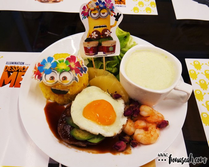 Aloha! Take a trip to Hawaii with Minions and indulge in the Hawaiian Iuau inspired plate of beef hamburg and garlic shrimp, accompanied by tropical pineapple and luxurious avocado. Margo, Edith and Agnes certainly thought this dish was a great idea for a honeymoon's set up for Gru and Lucy! It comes with a green soup of Gummi Bears and meat, courtesy of our darling Agnes.