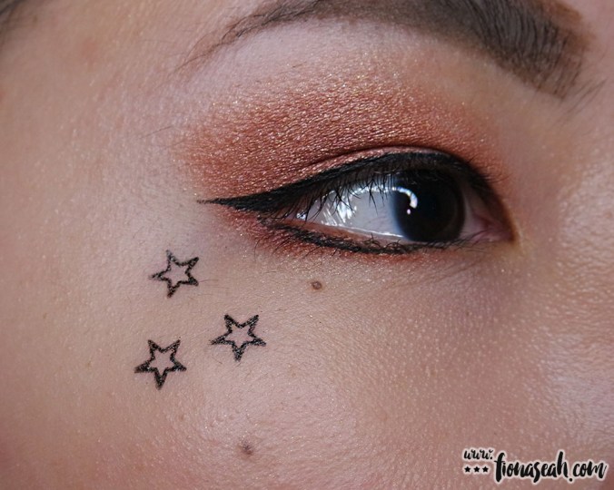 Super Star stamp on the cheekbone