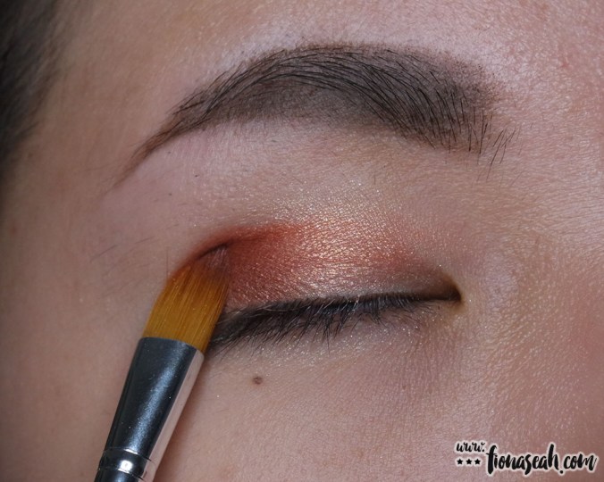 Define the eye by adding a darker shade on the outer corner