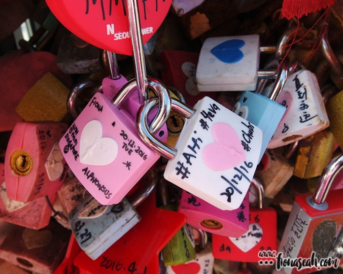 The railings were so overly saturated with padlocks that there wasn't any space left to hang ours and we had to resort to padlocking them to someone else's like a love triangle LOL. It won't be long before all these padlocks get removed because I doubt the railings will be able to withstand the weight of so much love 😛