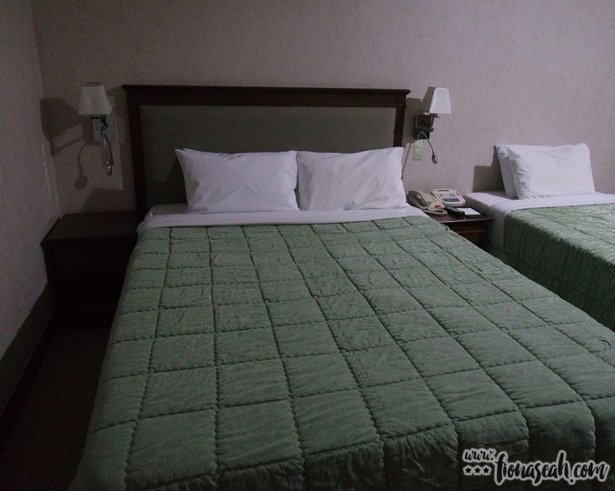 A dark corner next to the bed. Yikes!