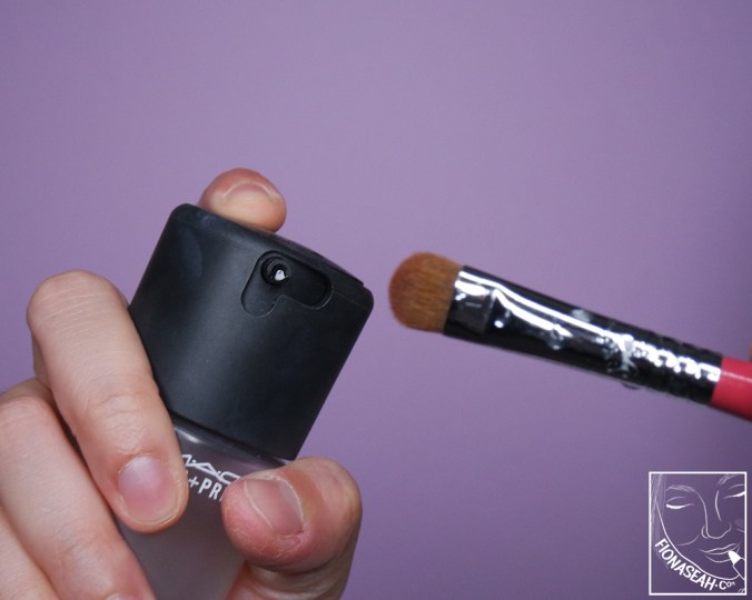 Wetting the brush so that the shade would be more prominent on my lids