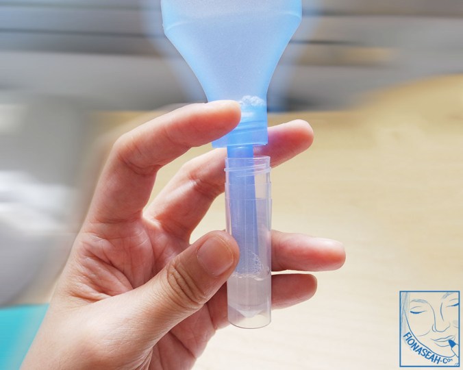 After shaking and screwing off the funnel